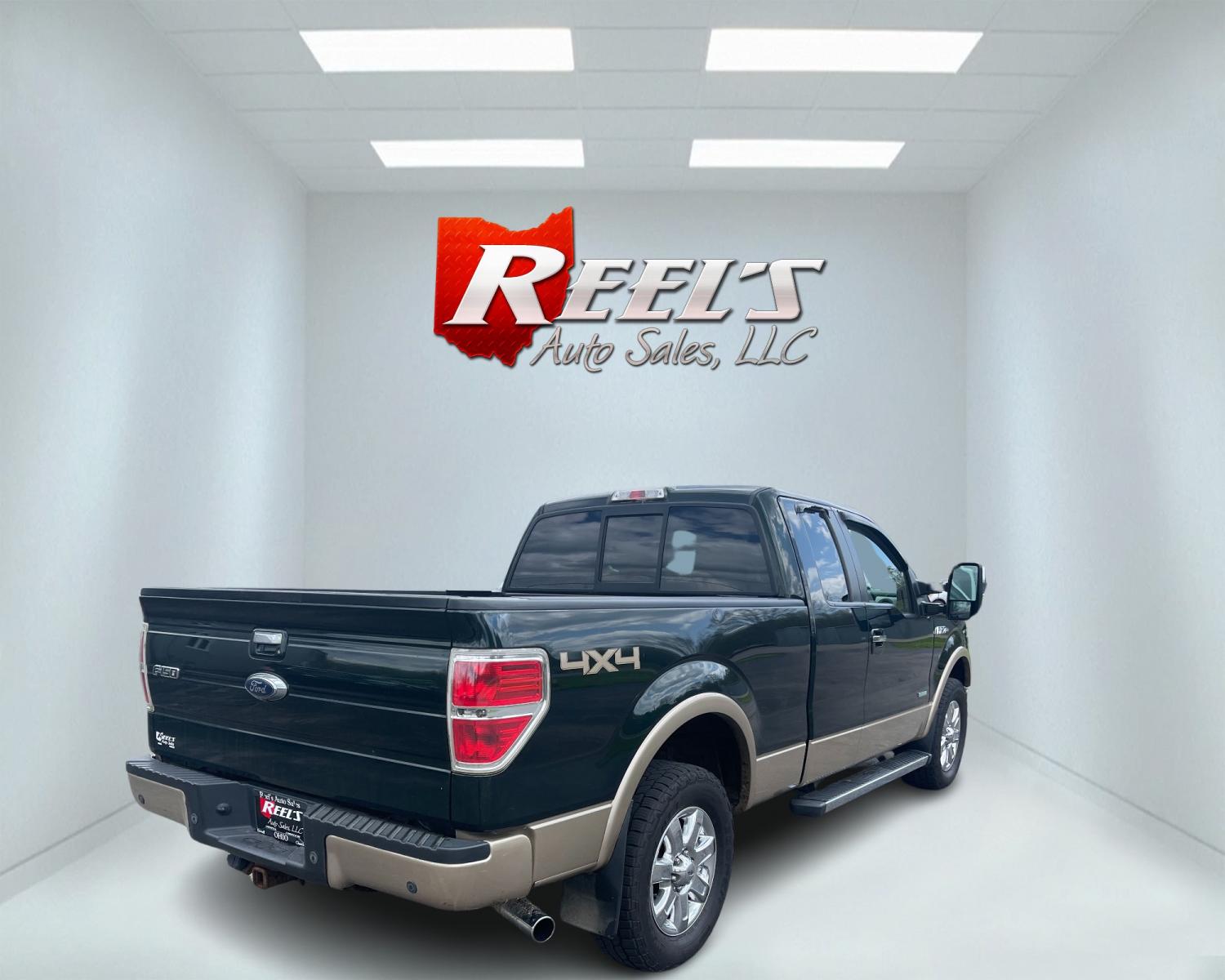2014 Green /Tan Ford F-150 Lariat SuperCab 6.5-ft. Bed 4WD (1FTFX1ET7EF) with an 3.5L V6 TWIN TURBO engine, 6-Speed Automatic transmission, located at 547 E. Main St., Orwell, OH, 44076, (440) 437-5893, 41.535435, -80.847855 - This 2014 Ford F-150 Lariat SuperCab with the 3.5 EcoBoost engine and 6-speed automatic transmission is a well-equipped truck designed for both comfort and performance. Key features include HID headlights, a backup camera with sensors, a power moonroof, and a premium Sony sound system. For extended - Photo #5
